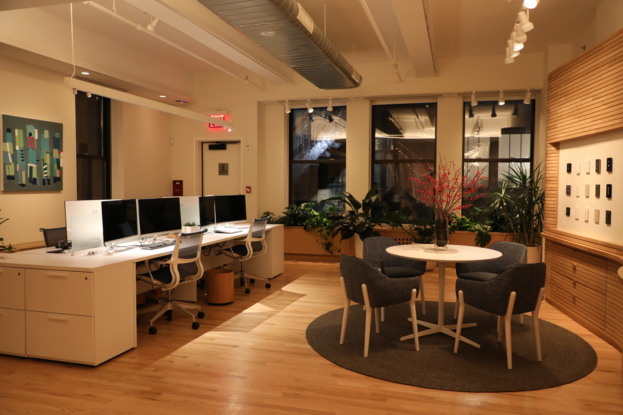 An office interior with warm Ketra lighting illuminating the space.